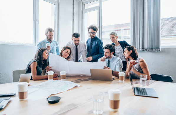 group of business people having a discussion around the table 